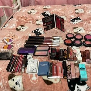 Mac and Kevin Aucoin powder blushes, some high-end designer lipstickslip liners,
